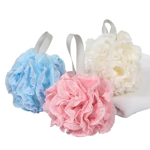 Set of three soft lace bath sponges in pink, blue, and white with hanging loops.