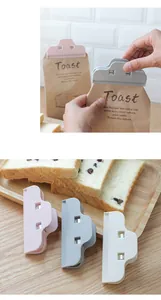Detail view of colorful Japanese style plastic food sealing clips for snack bags.