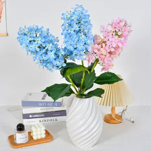Realistic macaron-colored tower hydrangea artificial flowers in a stylish white vase