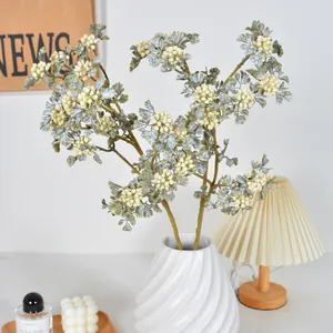 Autumn vintage artificial lace berry stems in white ceramic vase for home interior decor