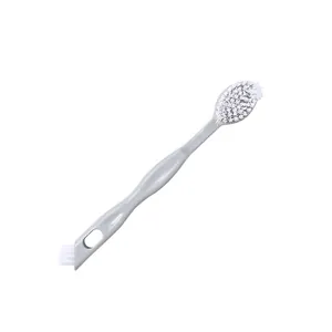 Professional double-headed shoe cleaning brush with long grey handle and hanging hole