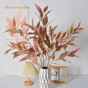 Lifelike 5-stem artificial eucalyptus greenery branches displayed in a white ceramic vase