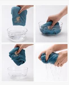 Blue microfibre hair towel demonstration showing high water absorption and easy wringing