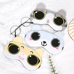 Cute cartoon animal sleep masks in grey, blue, and yellow on a white lace background.