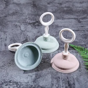 Durable mini sink drain plungers in pastel colors with ergonomic ring handles for kitchen