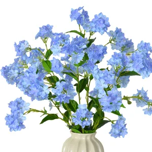 Elegant blue artificial hydrangea bouquet in a fluted cream ceramic vase for home decor