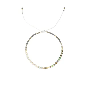 Detailed view of Morse code beaded bracelet with natural stones and adjustable cord