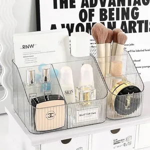 Clear acrylic desk organizer with compartments for cosmetics and makeup brushes