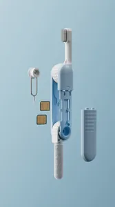 Vista ampliada de un kit de limpieza multifuncional con cepillo y ranuras para SIM.