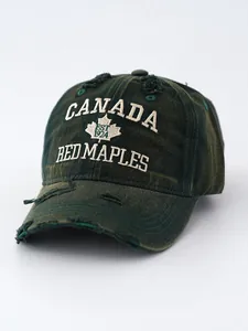 Vintage distressed washed green baseball cap featuring Canada Red Maples embroidery detail