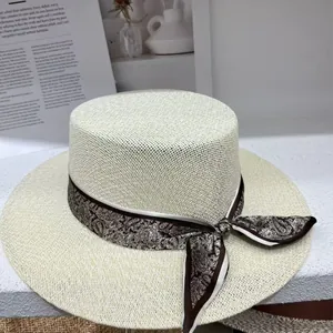 Vintage flat-top straw boater hat with elegant paisley ribbon for beach sun protection