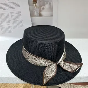 Vintage black flat top straw boater hat with hollow weave and paisley ribbon bow