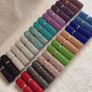 Detailed close-up view of various colorful full-rhinestone 10ml portable perfume spray bottles