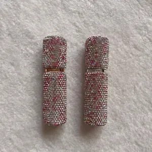 Close-up view of shimmering rhinestone portable 10ml empty perfume spray bottles
