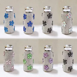 Kollektion verschiedener bunter Kristallblumen-Strass-Taschen-Thermoskannen