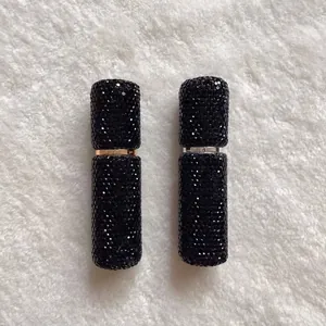 Detailed view of the sparkling black rhinestone encrusted 10ml perfume atomizer bottle
