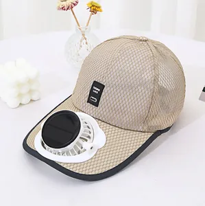 Detail view of solar-powered fan on breathable mesh baseball cap for summer sun.