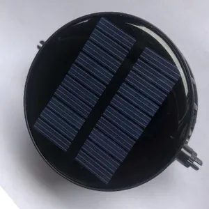 Detailed close-up of the circular solar panel module for an outdoor cooling fan hat