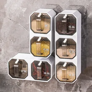 Wall-mounted seasoning box set for kitchen spice storage with integrated spoons.