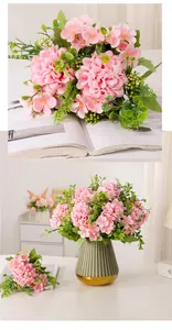 Close-up detail of pink artificial ping pong chrysanthemum flowers for home decor.