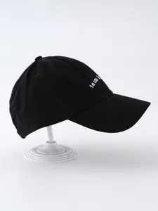 Side profile of black baseball cap featuring white Team Bride embroidery detail
