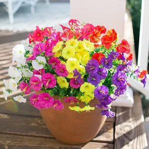 Vibrant artificial petunia flowers in a pot for outdoor garden and home decoration.