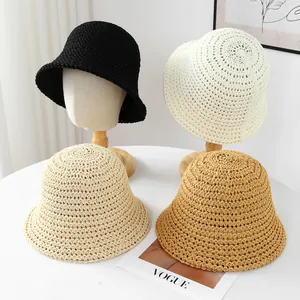 Handmade breathable straw bucket hats in various colors for summer beach sun protection