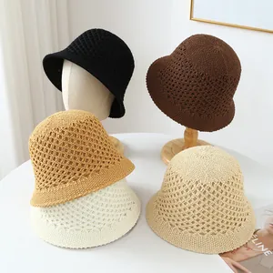 Selection of handmade breathable crochet bucket hats shown in various natural tones