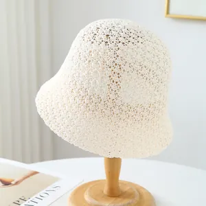 Breathable hand-crocheted bucket hat for summer beach and outdoor sun protection.