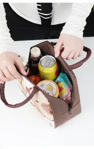 Detailed view showing the spacious capacity of this foil-lined cartoon lunch bag.