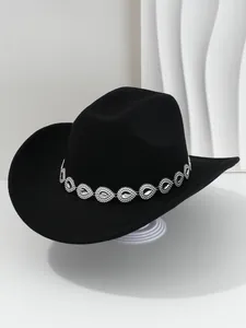Detailed view of a black cowboy hat with elegant teardrop rhinestone band decoration
