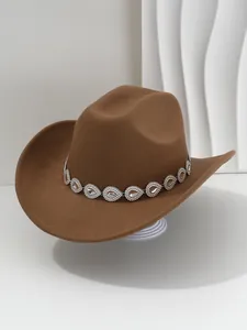 Close-up detail of a brown wool cowboy hat with elegant teardrop rhinestone band