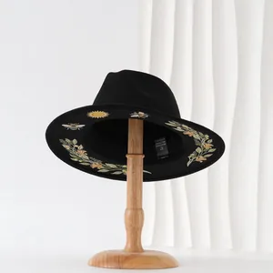 Black Gothic fedora hat featuring intricate floral and bee prints on the under-brim.