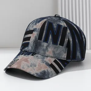 Men's stylish tie-dye baseball cap featuring bold letter prints and a curved brim.