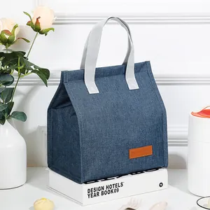 Sac isotherme portable pour déjeuner avec fermeture velcro et texture denim bleue pour le bureau