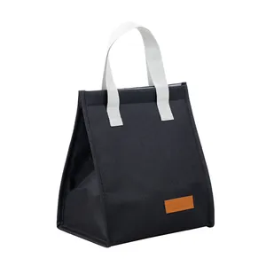 Sac à lunch isotherme noir minimaliste avec poignées blanches et base rectangulaire