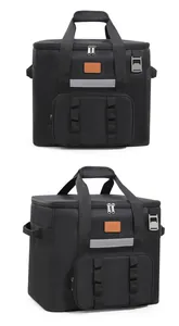 Zwei Ansichten einer schwarzen großen isolierten Picknicktasche mit Sicherheitsreflexstreifen