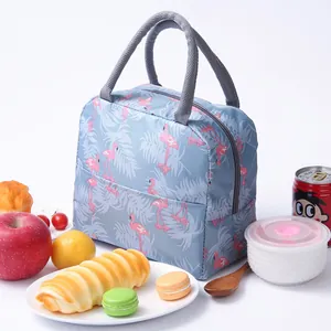 Portable insulated lunch bag with stylish blue flamingo print for office and school