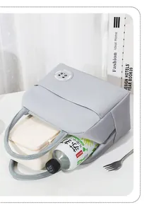 Oxford cloth lunch bag showing interior capacity with lunch box and bottle