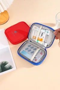 Interior view of portable medicine bag with mesh pockets and elastic straps for travel