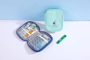 Detail view of portable medicine bag showing internal mesh pockets and storage