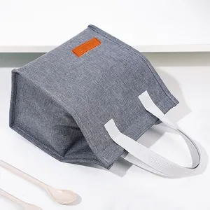 Grey insulated lunch bag with large capacity and portable handles for work
