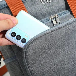 Large grey insulated lunch cooler bag featuring a front pocket for phone storage