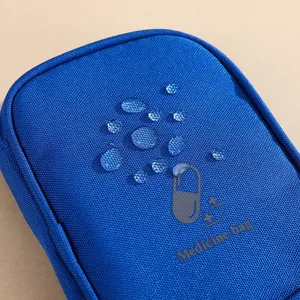Portable waterproof blue medicine bag with capsule print for first aid storage and travel