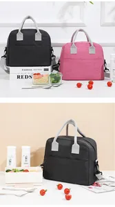 Detailed scene of large capacity insulated lunch bag featuring food containers and props