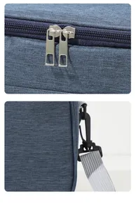 Close-up of high-quality metal zippers and sturdy shoulder strap hook on blue cooler bag