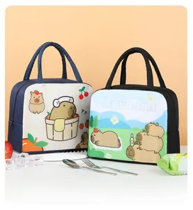 Close-up of two insulated lunch bags featuring cute cartoon capybara illustrations.
