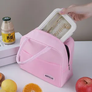 Portable pink insulated lunch bag for office or school meals, waterproof fabric.