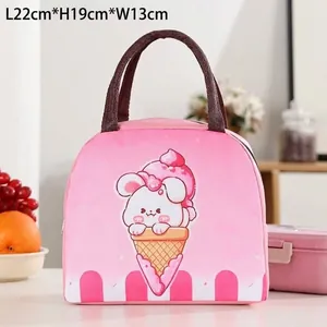 Macro detail of pink insulated lunch bag with cute rabbit print and size information
