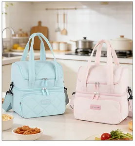 Blaue und rosa doppellagige isolierte Kühltaschen mit Steppmuster in der Küche